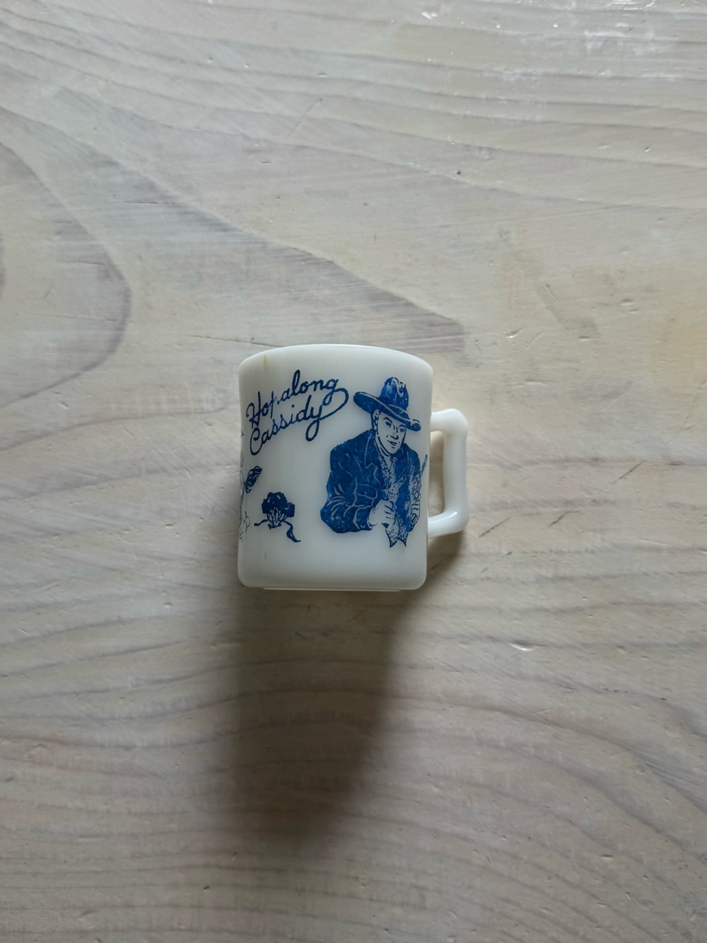 Classic White Ceramic Cowboy Mug with Blue Print